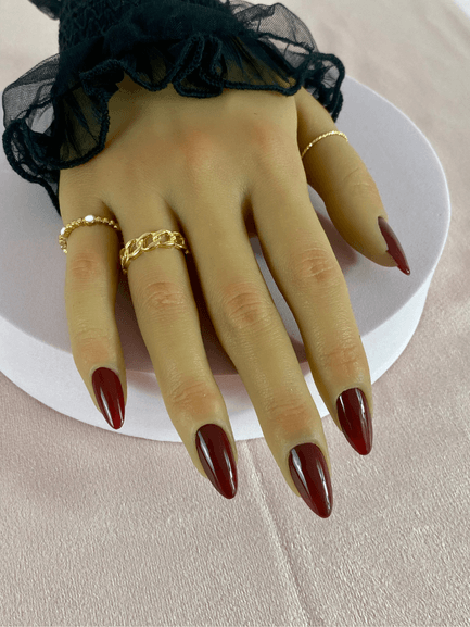 Faux ongles réutilisables, rouge foncé, avec finition brillante et forme amande.
