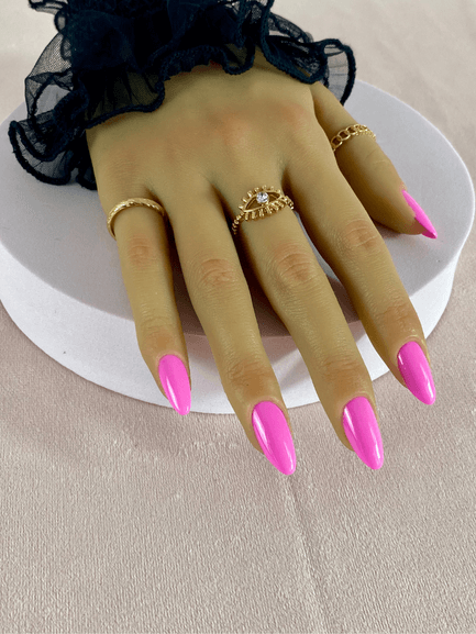Faux ongles réutilisables, rose fluo, avec une forme amande et finition brillante.