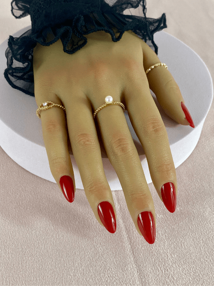 Faux ongles réutilisables, couleur rouge, en forme d'amande et finition brillante.