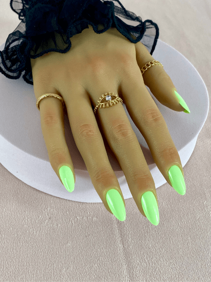 Ensemble de faux ongles réutilisables avec une couleur vert pomme et une forme amande. 