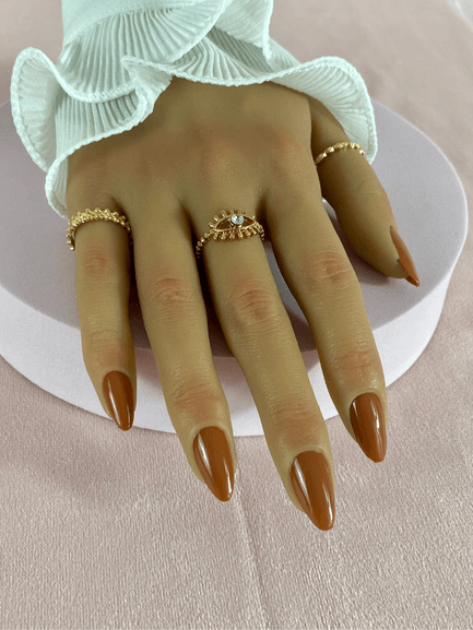 Faux ongles réutilisables, couleur caramel, en forme d'amande et finition brillante.