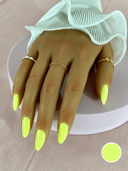 Ensemble de faux ongles réutilisables à coller avec des adhésifs avec une couleur jaune fluo finition brillante.