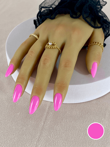 Faux ongles réutilisables à coller avec des adhésifs, rose fluo, avec une forme amande et finition brillante.