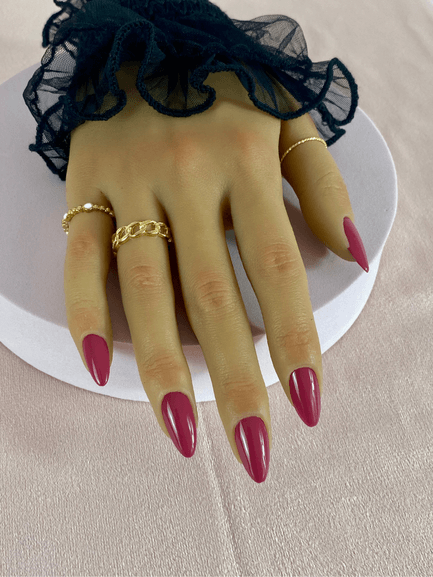 Faux ongles réutilisables, couleur rose fuchsia, en forme d'amande, avec une finition brillante.