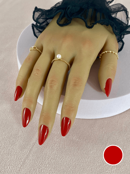 Faux ongles réutilisables coller avec des adhésifs, couleur rouge, en forme d'amande et finition brillante.
