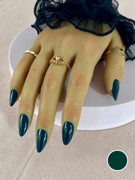 Ensemble de faux ongles réutilisables à coller avec des adhésifs, de couleur vert sapin, en forme d'amande et finition brillante.